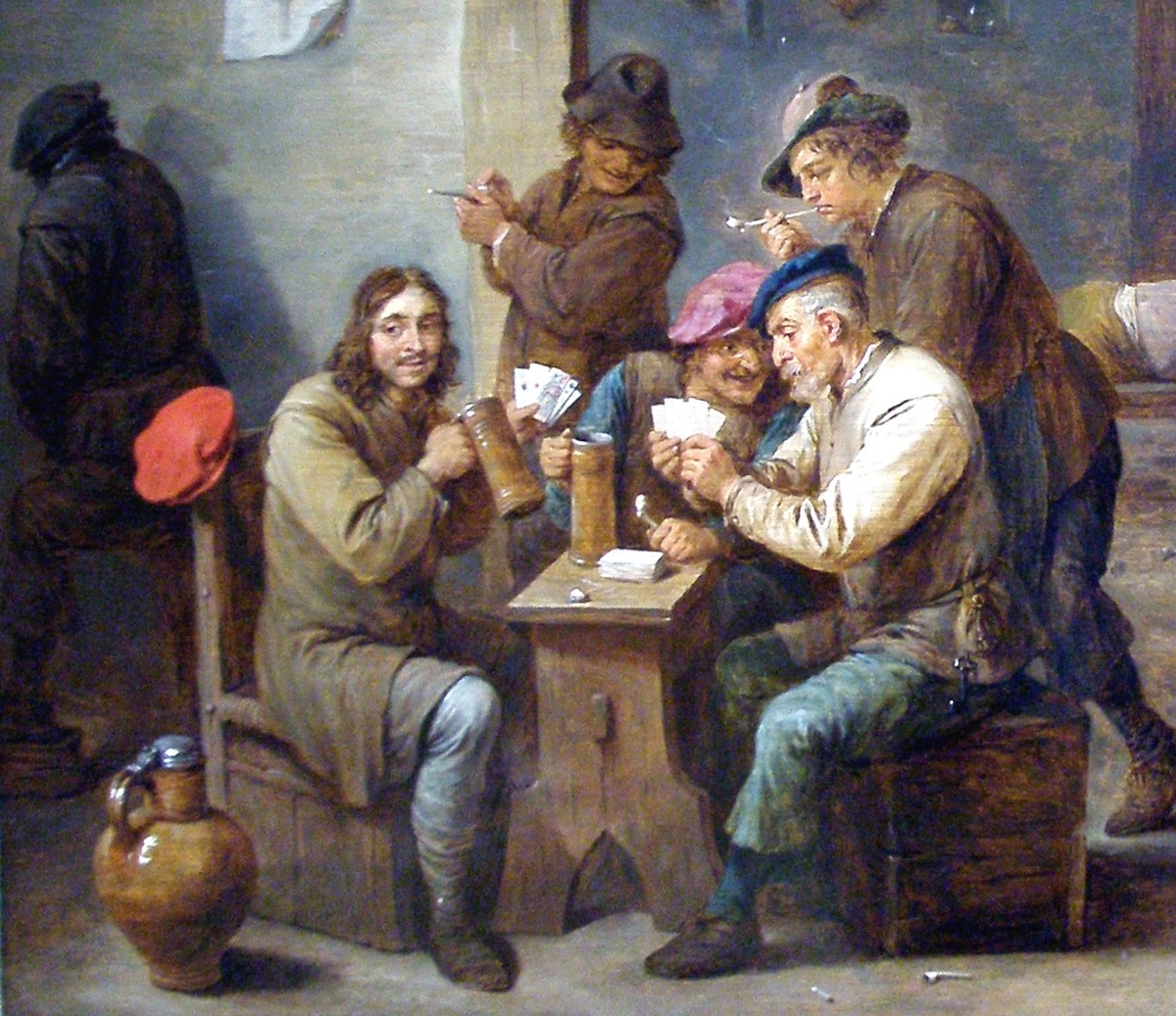 Gemälde mit Wirtshausszene aus dem 17. Jahrhundert. Männer sitzen an einem Tisch, trinken, rauchen und spielen Karten. Im Hintergrund schläft ein Mann auf einer Bank, weitere Männer unterhalten sich. Jemand kommt zur Tür herein.  © Wikimedia